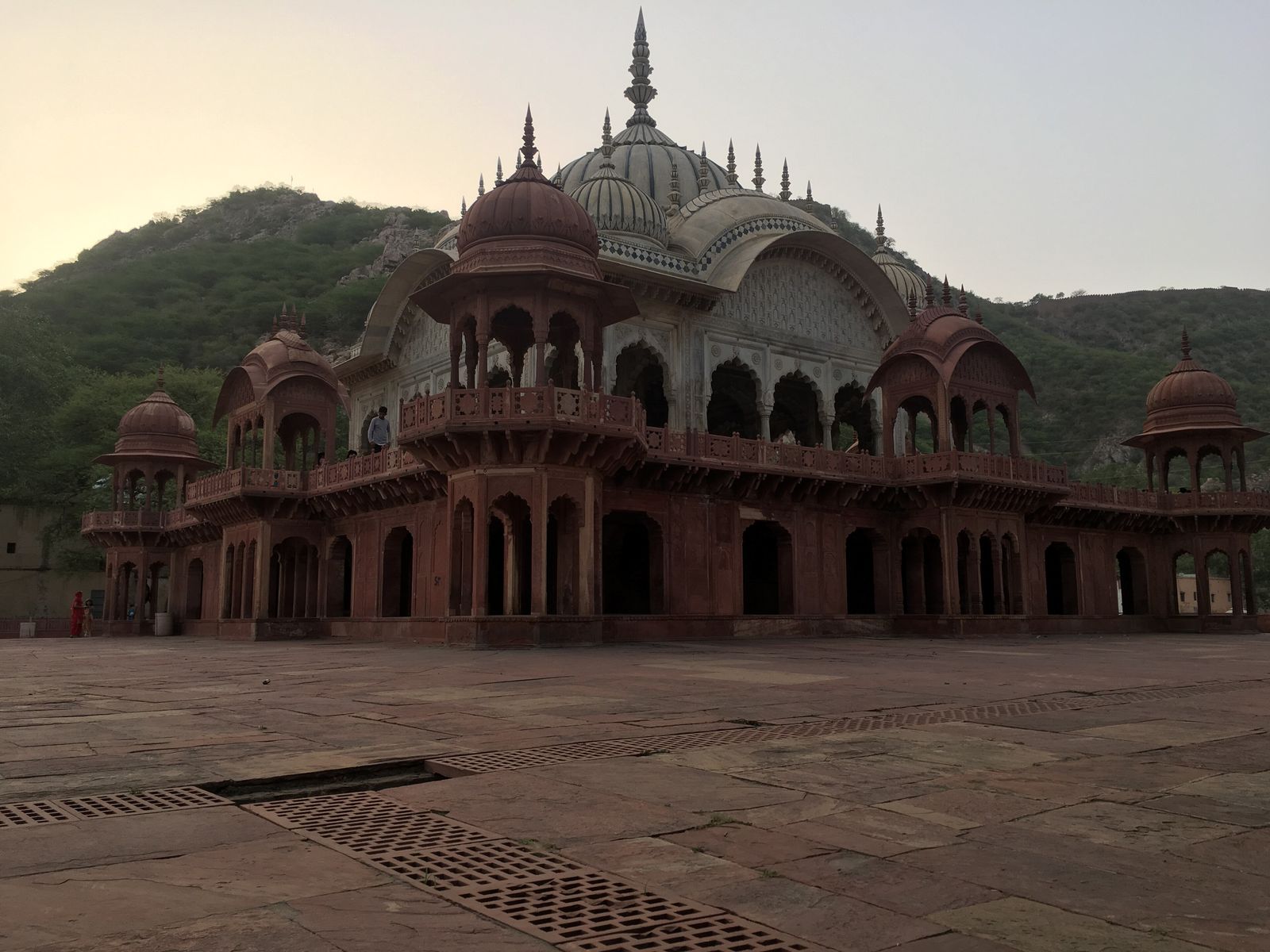 The Moosi Maharani cenotaph beside the Sagar tank in Alwar, with the ridge behind