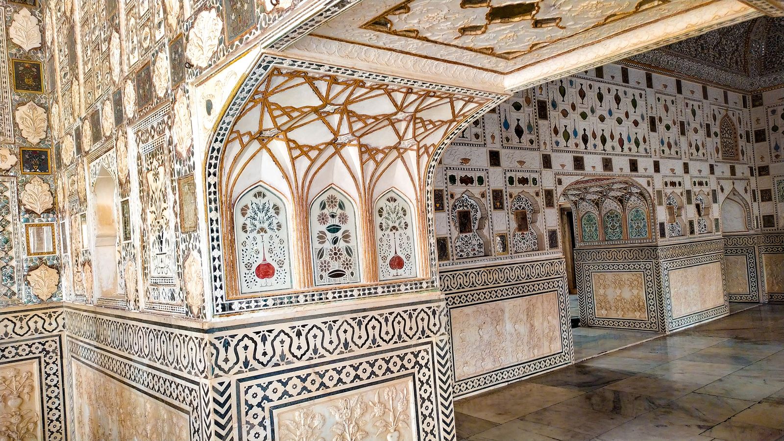 The mirrored walls and ceiling of the Sheesh Mahal in Amber Fort
