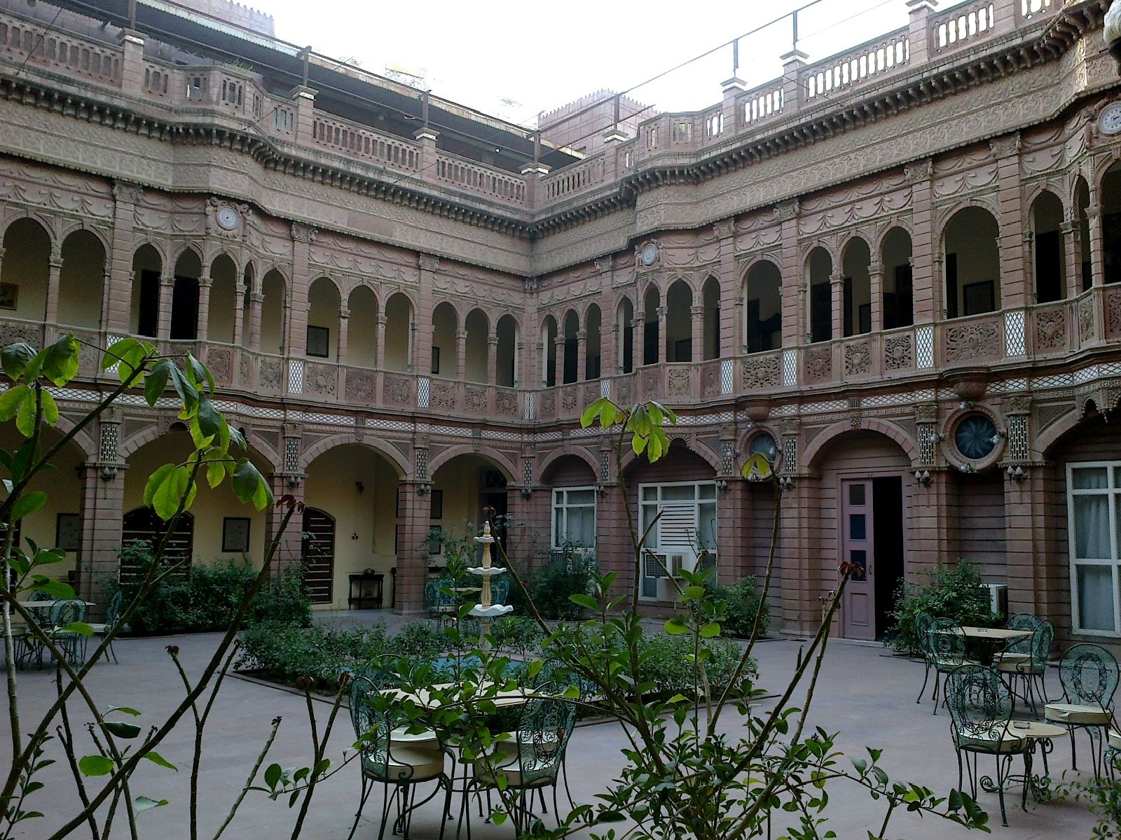 The carved rose sandstone facade of Bhanwar Niwas haveli in Bikaner's old city