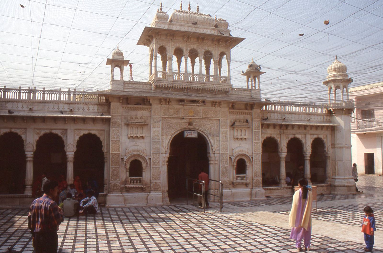 The white marble facade and carved gateway of the Karni Mata Temple in Deshnoke, near Bikaner