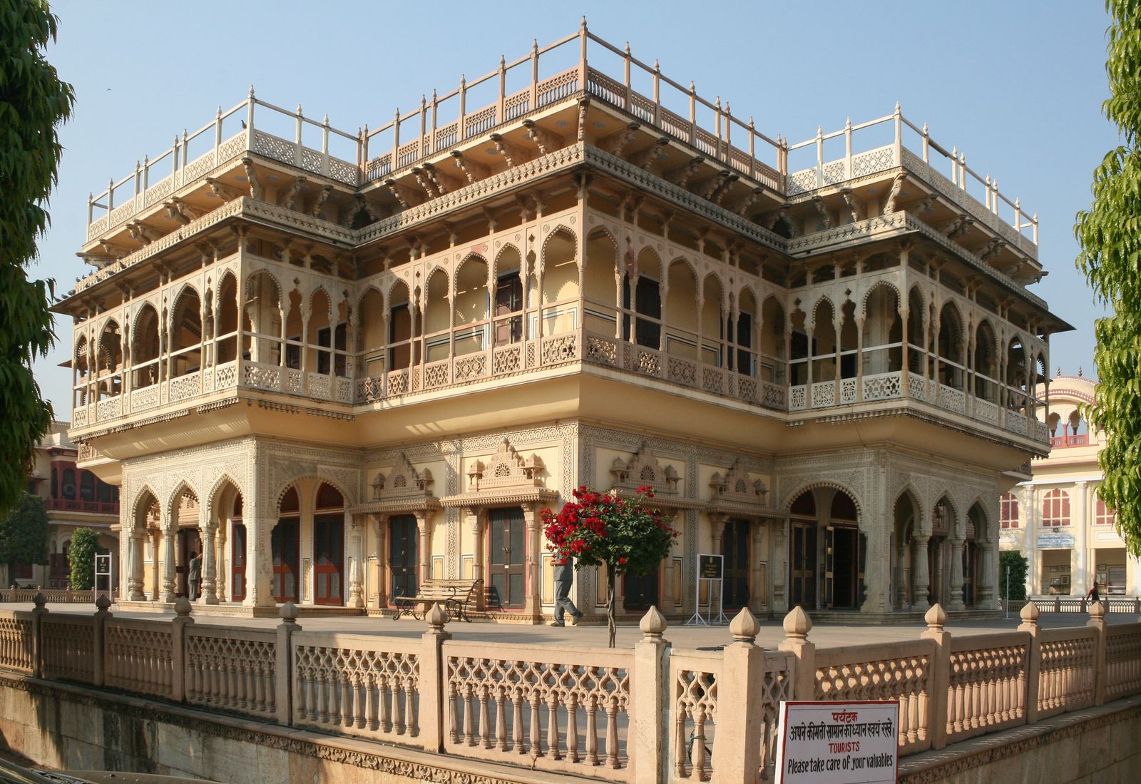 The carved white and cream facade of the Mubarak Mahal in the City Palace, Jaipur