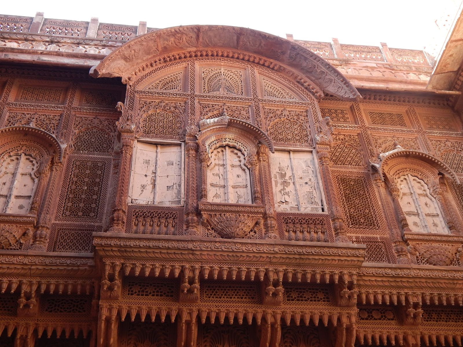 A carved sandstone jharokha window at Mehrangarh Fort