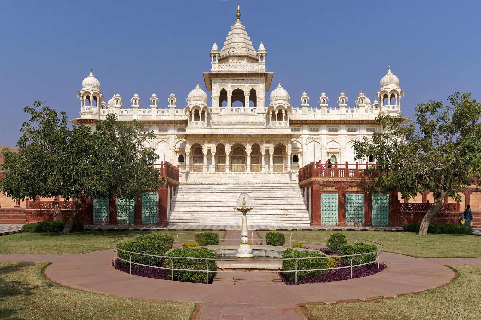 The white marble cenotaph of Jaswant Thada beside a small lake on a rocky ridge in Jodhpur