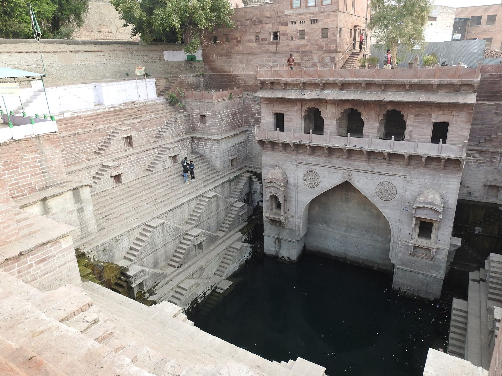 The carved sandstone steps of Toorji ka Jhalra stepwell in Jodhpur's old city