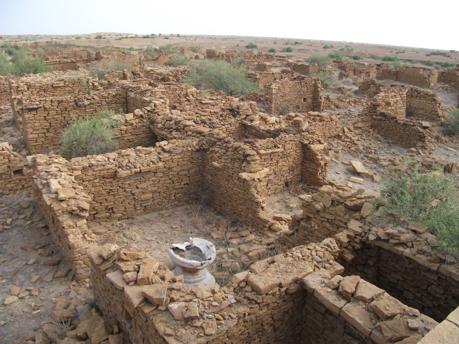 Roofless sandstone houses of the abandoned village of Kuldhara near Jaisalmer
