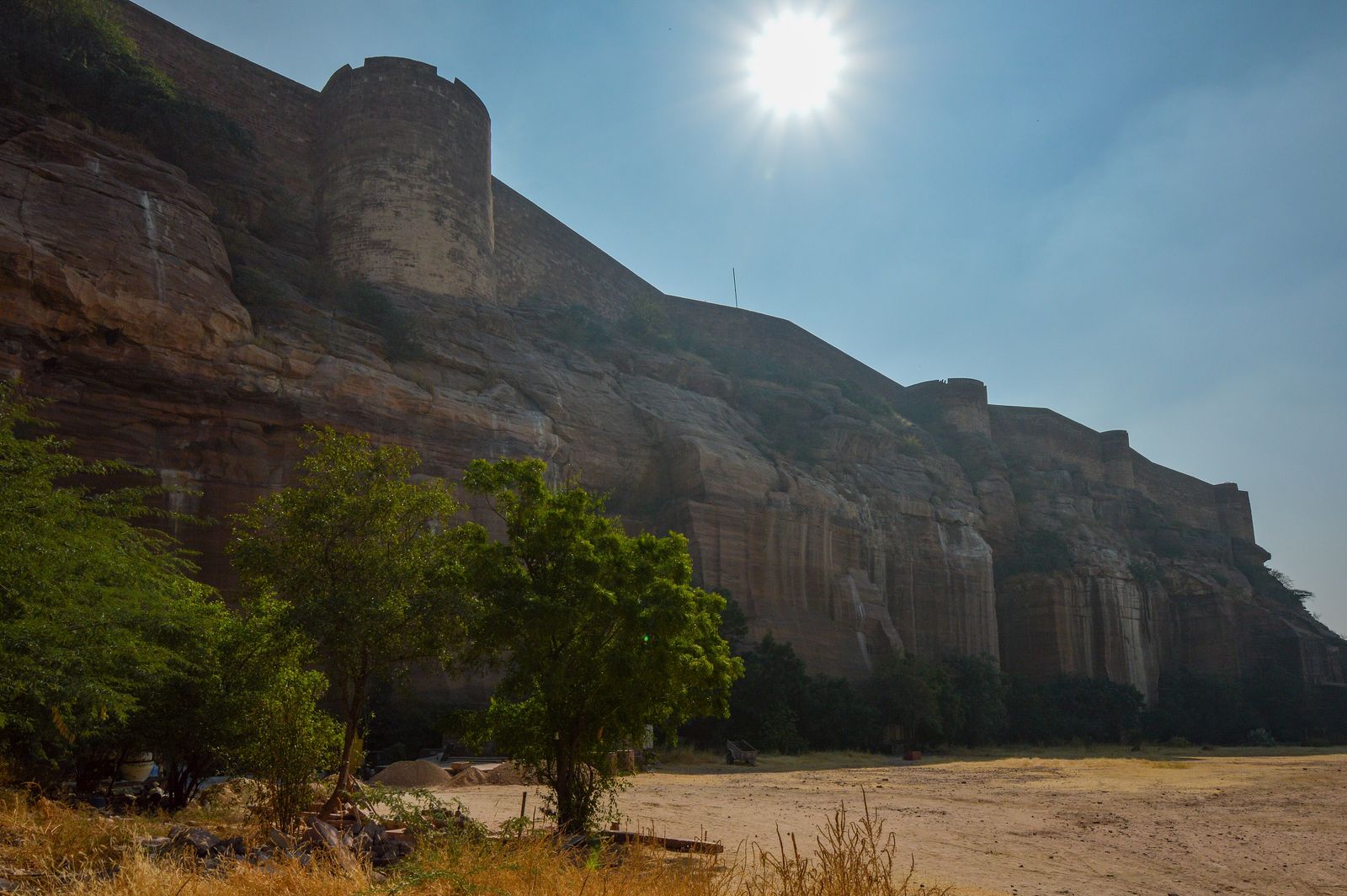Mehrangarh Fort rising from its rock cliff above the blue houses of Jodhpur