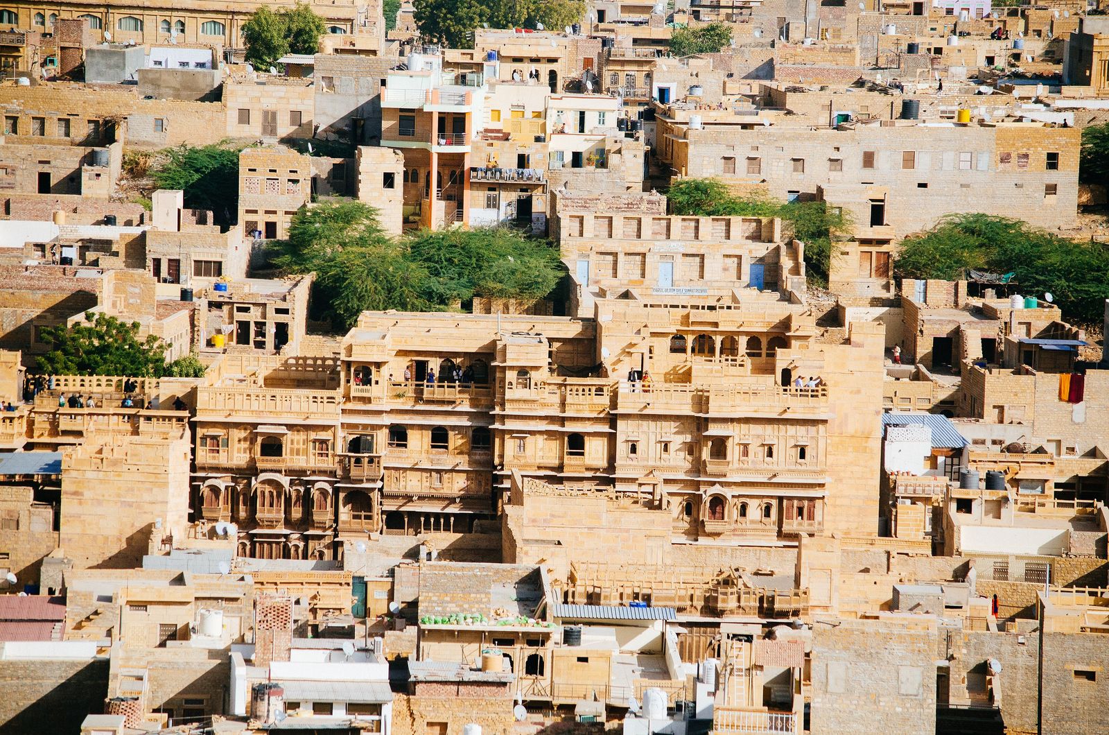 The carved yellow sandstone facades and balconies of Patwon ki Haveli in Jaisalmer