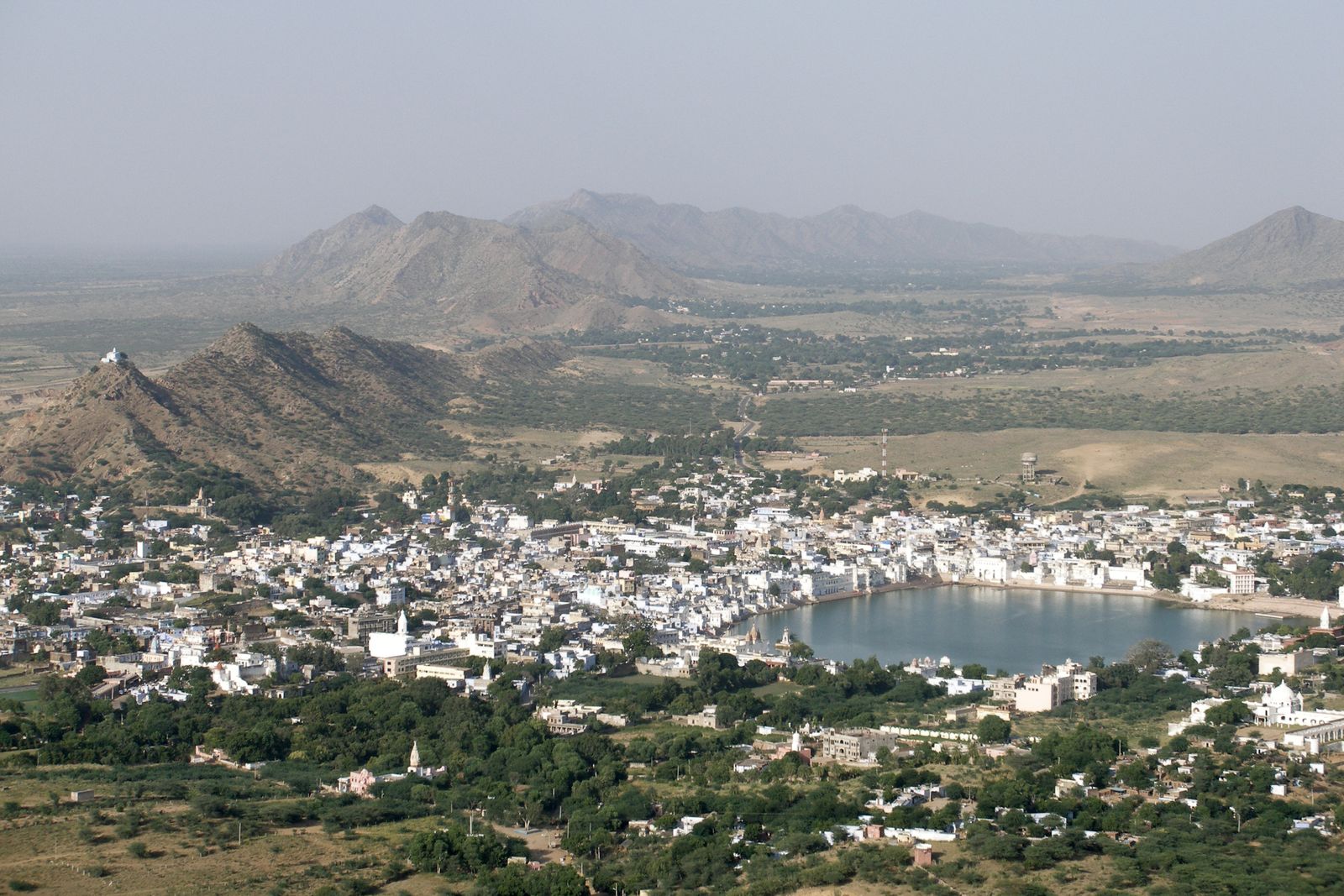 Fields and low Aravalli hills in the countryside outside Pushkar in the soft evening light