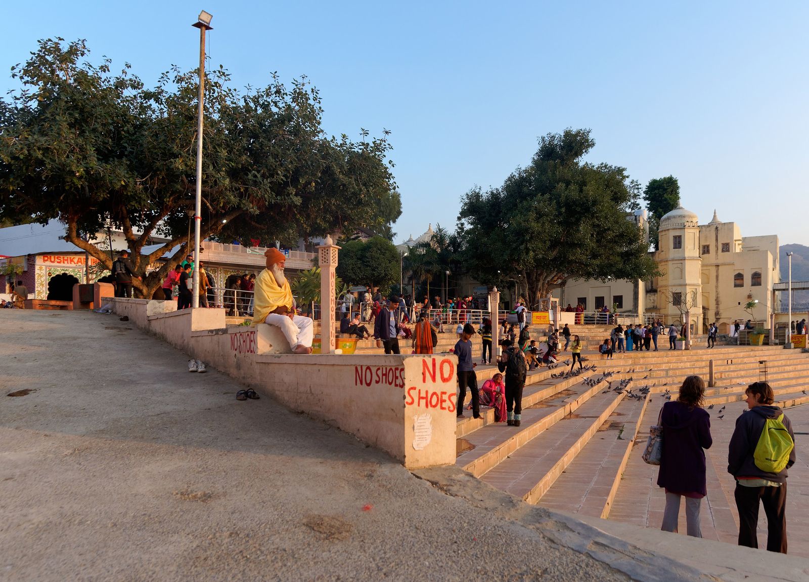 The whitewashed ghats and temples of Pushkar stepping down to the sacred lake