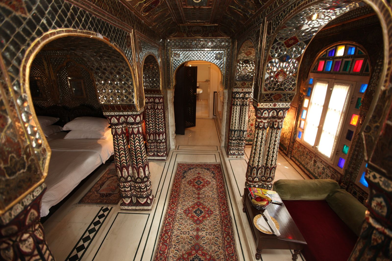 The mirrored Sheesh Mahal suite at Samode Haveli in Jaipur