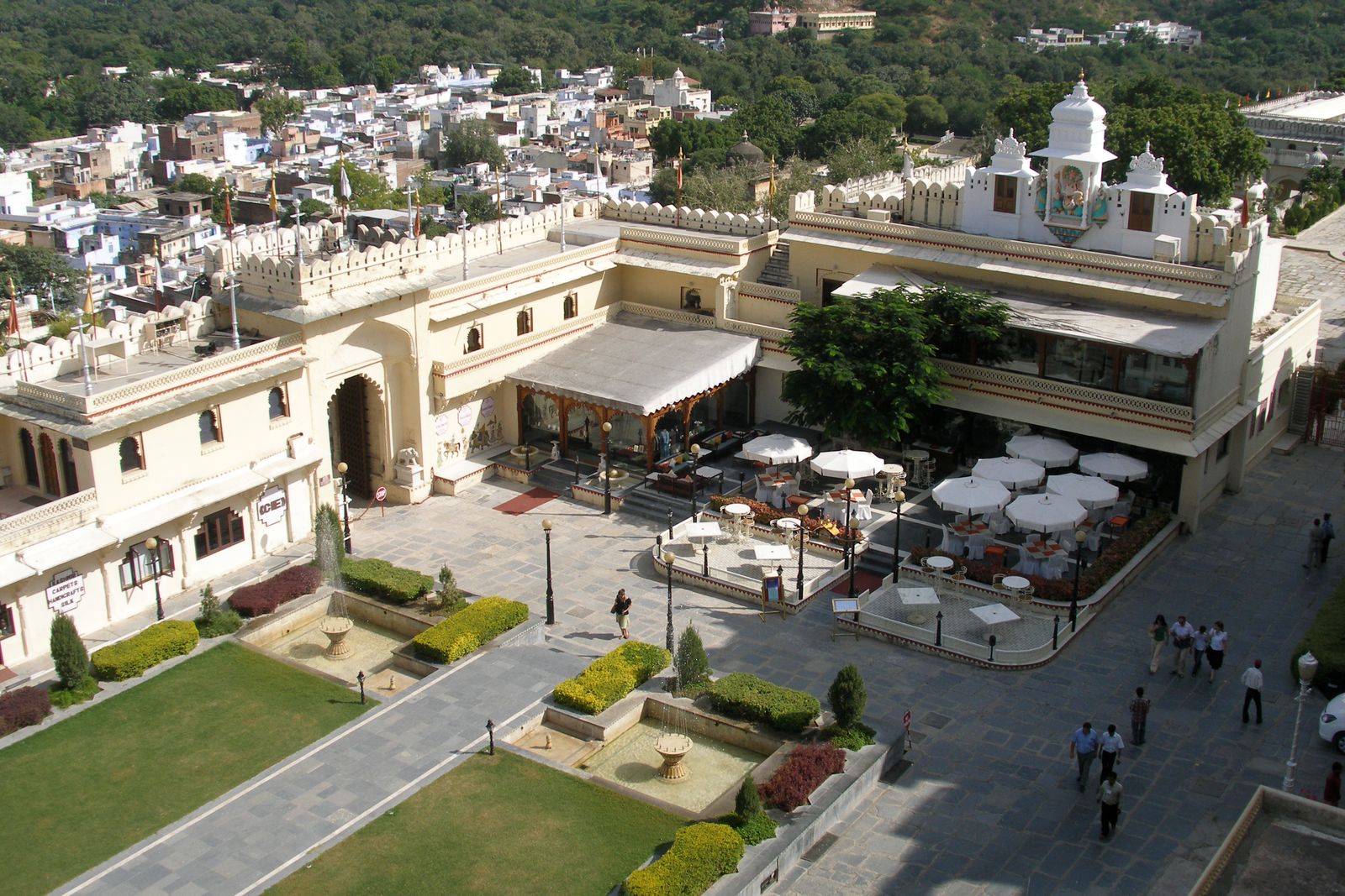 Arched balconies and carved windows around an inner courtyard of the City Palace in Udaipur