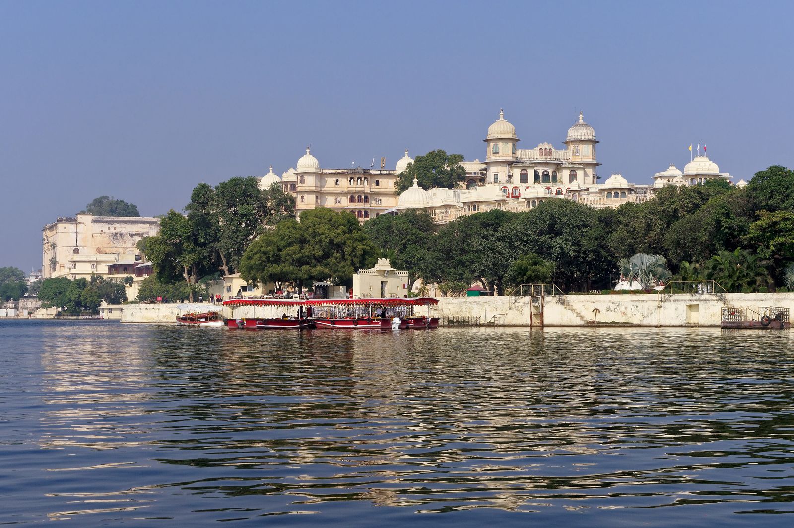 The curved white facade of Shiv Niwas Palace inside the City Palace complex in Udaipur